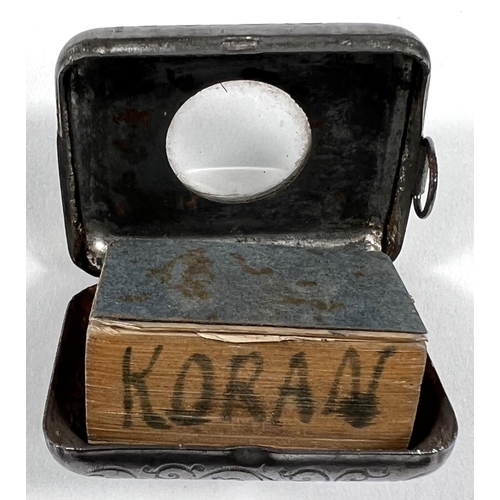 730 - A miniature volume of the Koran in white metal fob case; a hallmarked silver and mother-of-pearl pen... 