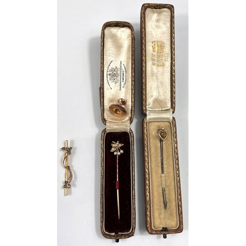 732 - Two Edwardian stickpins set seed pearls; a bar brooch set seed pearls; a 9 carat stud, 1gm