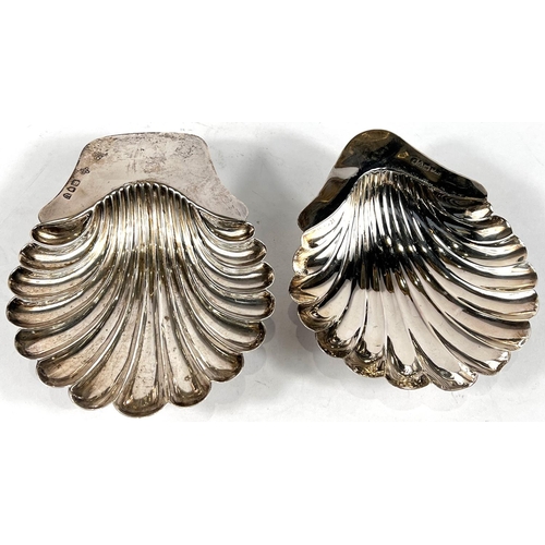 742 - Two hallmarked silver shell dishes on triple-ball feet, Chester date worn, London 1895, gross 3.5oz