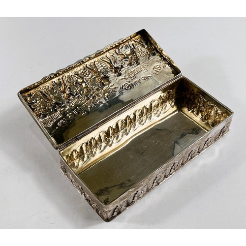 755 - A hallmarked silver rectangular box with embossed decoration of classical figures in procession, Che... 