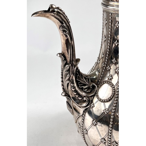 757 - A 19th century hallmarked silver baluster coffee pot, crested and with extensive beaded decoration, ... 