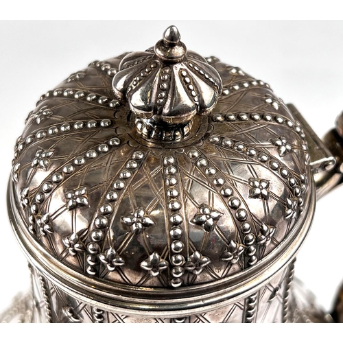 757 - A 19th century hallmarked silver baluster coffee pot, crested and with extensive beaded decoration, ... 