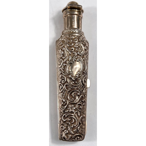 765 - A vial container with hinged body, heavily embossed decoration, Chester 1899, length 9cm, 3.7oz