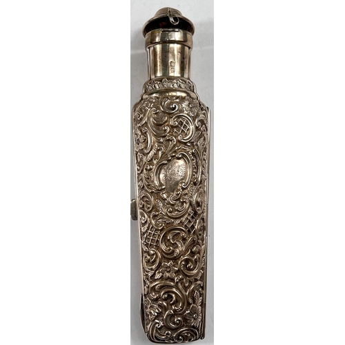 765 - A vial container with hinged body, heavily embossed decoration, Chester 1899, length 9cm, 3.7oz