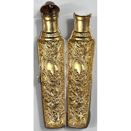 765 - A vial container with hinged body, heavily embossed decoration, Chester 1899, length 9cm, 3.7oz