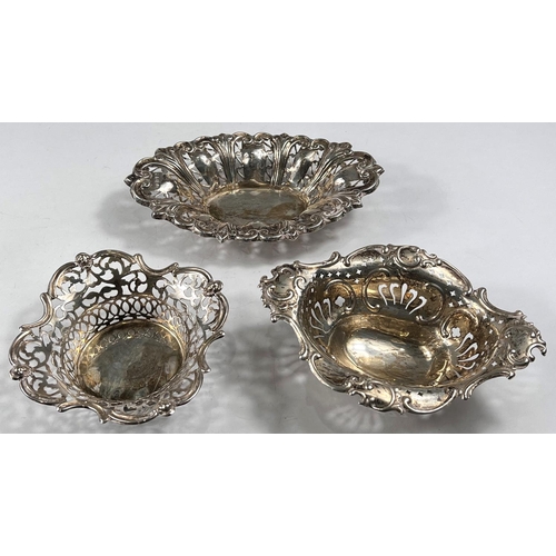 766 - A hallmarked silver oval bonbon dish, embossed and pierced, Chester 1898; another, stamped 'Sterling... 