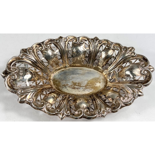 766 - A hallmarked silver oval bonbon dish, embossed and pierced, Chester 1898; another, stamped 'Sterling... 