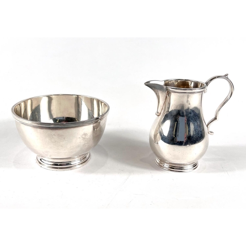 775 - A hallmarked silver cream jug and sugar bowl with stepped feet, Sheffield 1955, 8.2oz