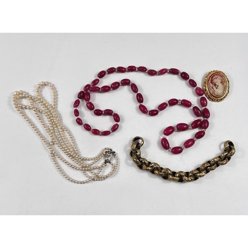 794 - A necklace of pink quartz/hardstone beads alternating with clear beads, length 80cm approx; a faux c... 