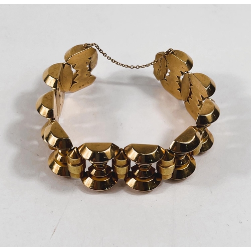 798 - A 'Machine Age' wide chunky bracelet, formed from rose and yellow metal spindle links, stamped 'Rosa... 