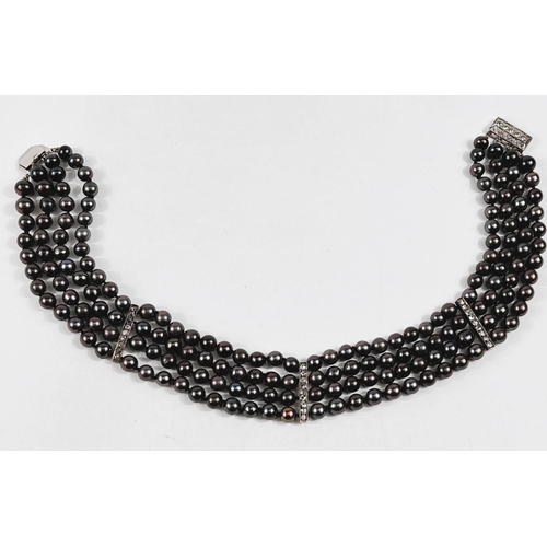 802 - A choker necklace formed from 4 strands of black pearls, 3 vertical decorative bars each set 9 old c... 