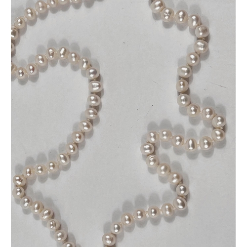 804 - A single strand necklace of 110 pearls, approx, average diameter 7mm, with natural blemishes, length... 