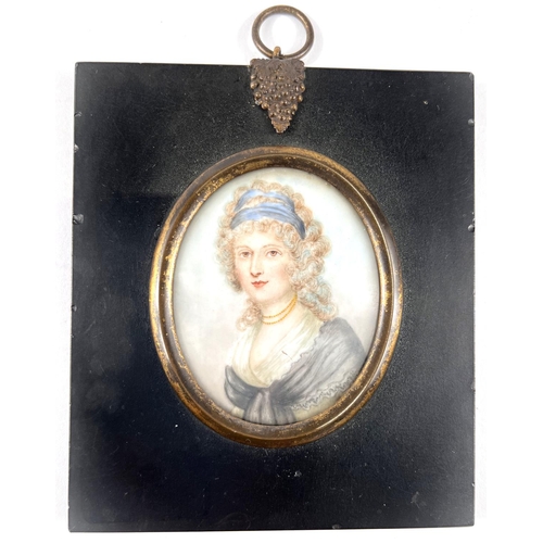 894 - A 19th century miniature portrait of a woman in dress with scarf, in ebonised frame with gilt mount ... 