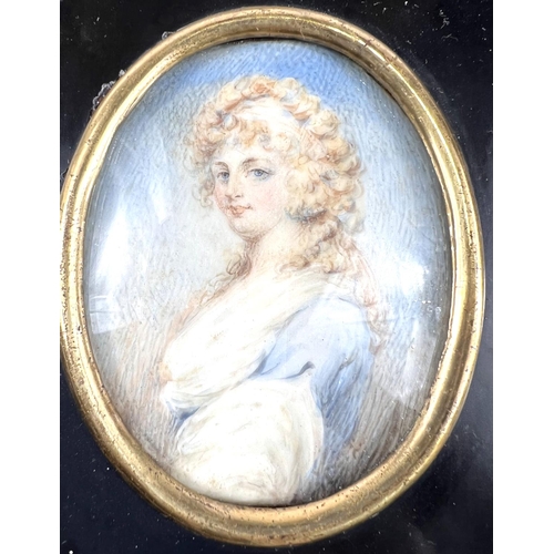 895 - A 19th century miniature portrait of a young woman with blonde hair and blue dress in ebonised frame... 