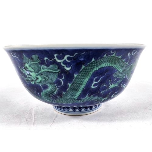 404A - A Chinese mottle blue ground bowl with green dragon decoration, bearing seal mark to base, diameter ... 