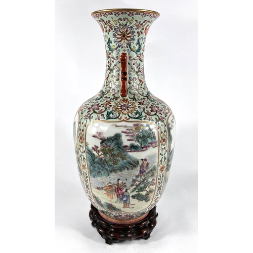 406A - A Chinese famille rose vase with four detailed panels of deities, green glaze, 6 character mark to b... 