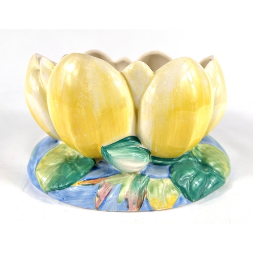 496A - Clarice Cliff for Newport Pottery, a bowl in the form of a waterlily, printed mark, length 22 cm