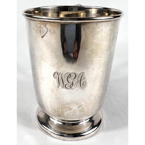 630 - A hallmarked silver 1 pint mug on circular foot with 'S' scroll handle, monogrammed, 9.5oz., height ... 