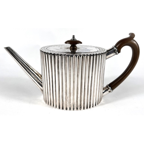 632 - A Georgian hallmarked silver tea pot of oval ribbed form with inscriptions, London 1781, maker Rober... 