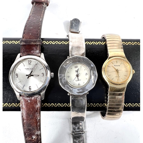 701 - A mid century Arbona automatic gents wrist watch in gilt case, three other wristwatches