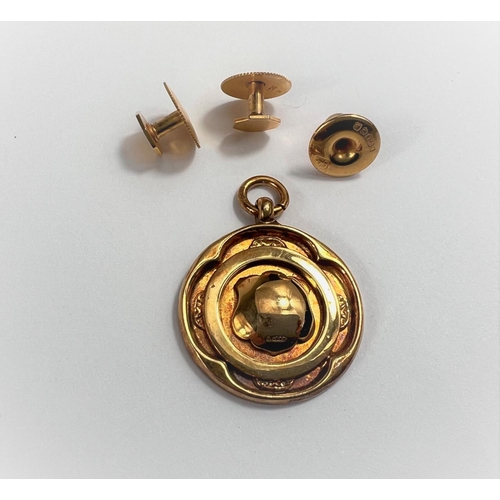 652 - A 9 carat hallmarked gold medallion; 3 studs stamped '9ct'