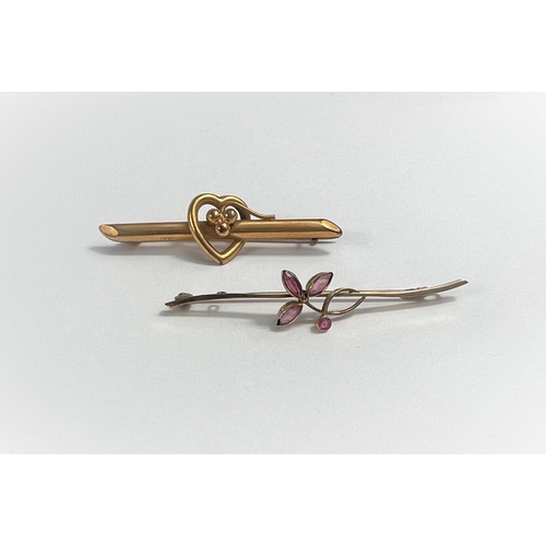 668 - An Edwardian 9 carat hallmarked gold bar brooch set pink stones; another set with a heart, 4gm gross