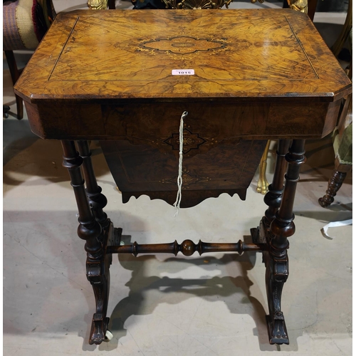 1015 - A Victorian burr walnut inlaid sewing table with boxwood and ebony inlay, fitted interior, turned su... 