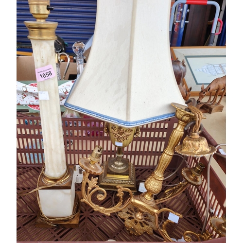 1058 - A marble Corinthian column lamp, a gilt urn shaped lamp and another light fitting