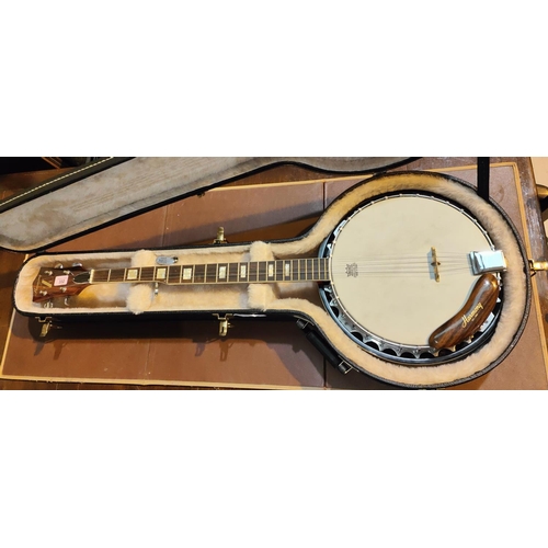 332 - A Harmony 5 string banjo in hard case