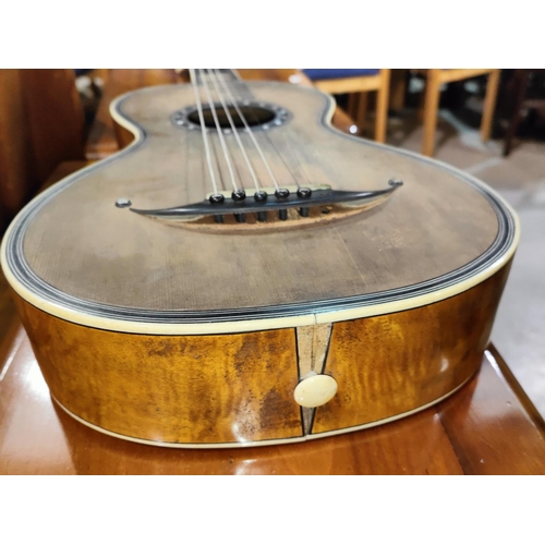 341 - A 19th century Rene Lacote style small bodied French guitar with ivory and mother of pearl inlay to ... 