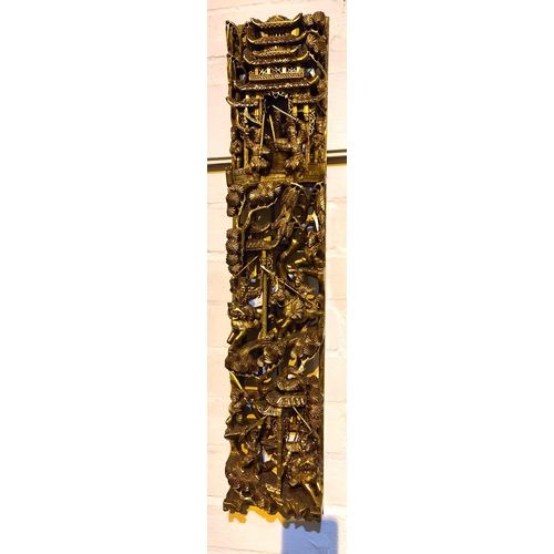 449 - A Chinese carved and pierced gilt wood wall hanging decoration, wit warriors fighting below a temple... 