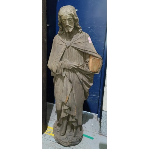 93 - A large carved wooden statue of Jesus stood with head bowed one arm across middle (one arm missing),... 