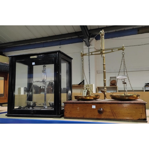 97B - A 20th century laboratory/jewellers scales in ebonised case, by De Grave Short; a set of brass weigh... 