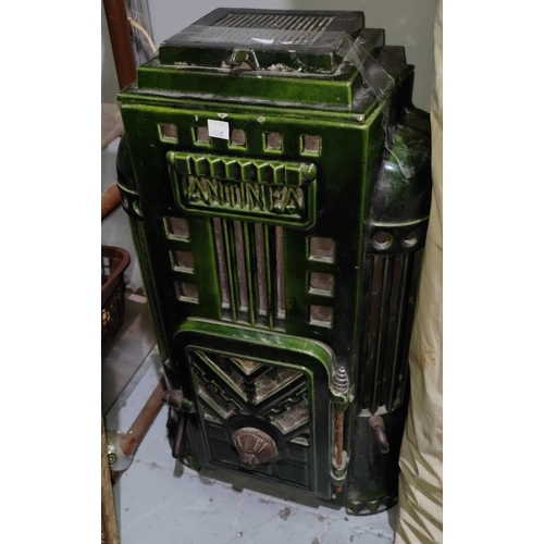 97C - An Art Deco style log burning stove with single door, in green enamel by Antinea, height 62cm, width... 