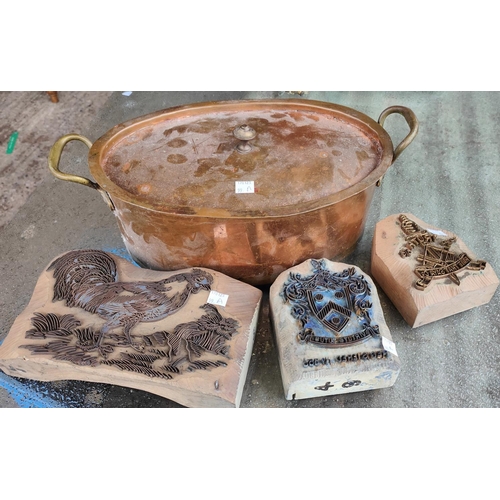 99A - A copper pan, three printing blocks and a selection of wooden oriental stands etc