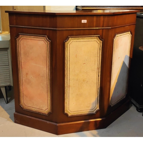 1011 - A period style mahogany bar with leather effect panels