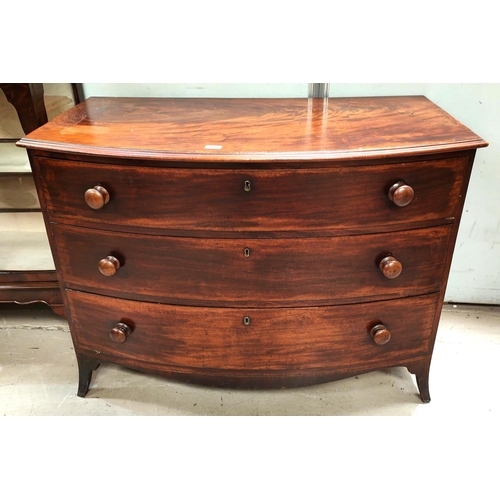 1019 - A Georgian mahogany bow front chest of three long drawers, inlaid around bracket feet length 112 x h... 