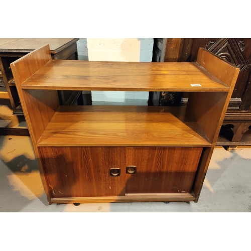 1021 - A mid 20th century teak side cabinet with shelf and sliding door, cupboard below