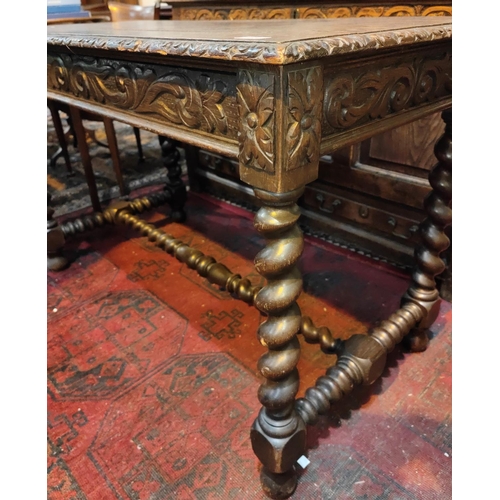 1026 - A carved oak plank top library/desk table with barley twist legs and supports, single drawer, natura... 