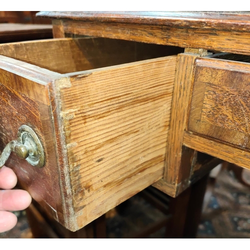 1028 - A Georgian cross banded oak lowboy with squared champhered legs, three drawers ht. 71cm x depth 32cm