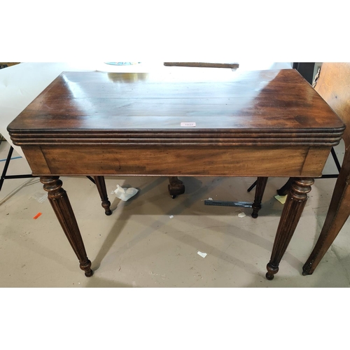 1032 - A 19th century mahogany Gillows style fold over tilt top card table with ribbed rounded edges, reede... 