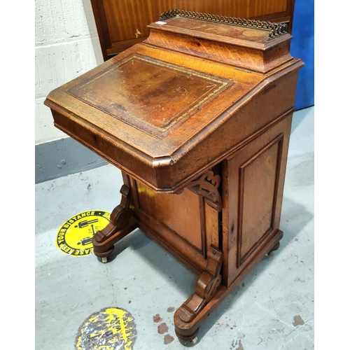 1036 - A Victorian oak Davenport with brown leather insert fitted interior in satin type wood and cupboard ... 