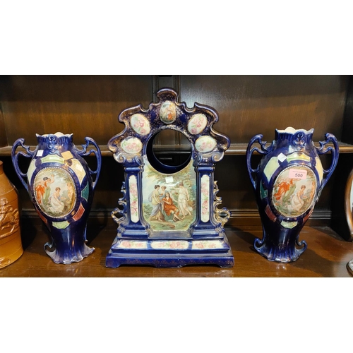 500 - A pair of Vienna style baluster two handled vases, with classical scenes in polychrome to the reserv... 