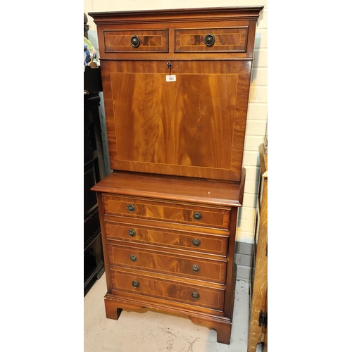 923 - A reproduction mahogany dwarf secretaire/side cabinet with fall front and fitted interior over 4 dra... 