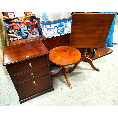 937 - A reproduction mahogany three draw chest, a square tilt top occasional table and another table