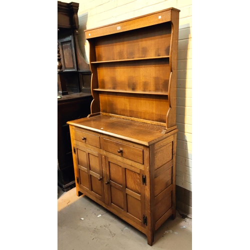 958 - An early 20th century golden oak Welsh dresser