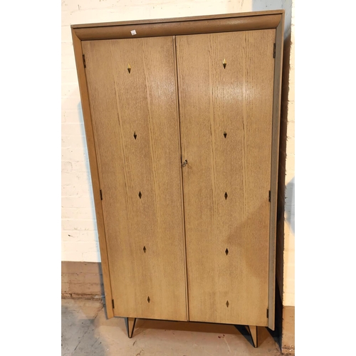 963 - A 1950's 'Link' limed wood bedroom suite comprising double wardrobe, gent's fitted wardrobe and 4 he... 