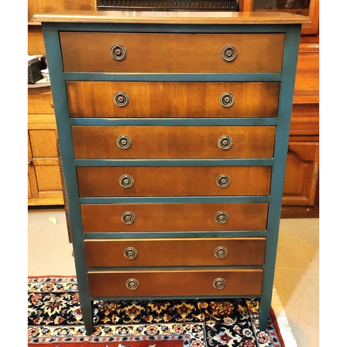 982 - A continental style 7 height chest of drawers in walnut and grey finish