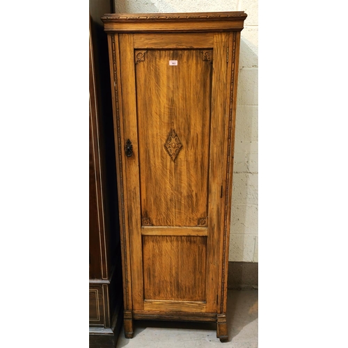 983 - A Jacobean style oak single door hall robe