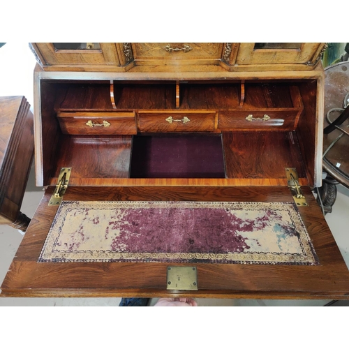 996 - A 19th century French walnut bureau de dame crossbanded in kingwood and with boxwood inlaid decorati... 